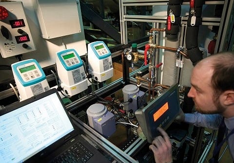 Boiler being tested for efficiency by a dedicated employee